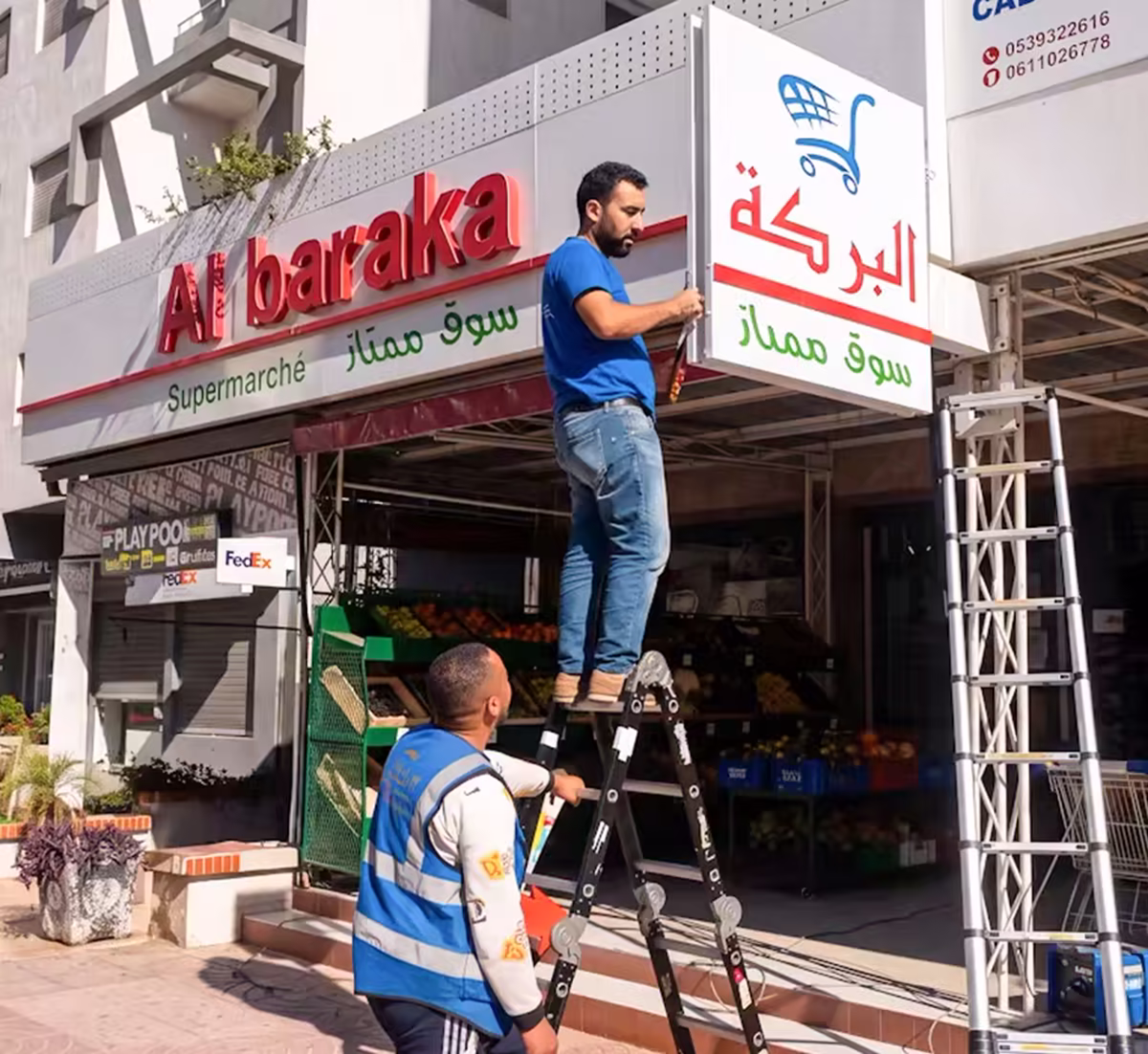 Pose d'enseigne Al Baraka supermarché à Tanger — impression UV